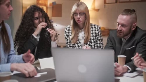 Diverse Business Team Discussing Project Strategy in Office Meeting