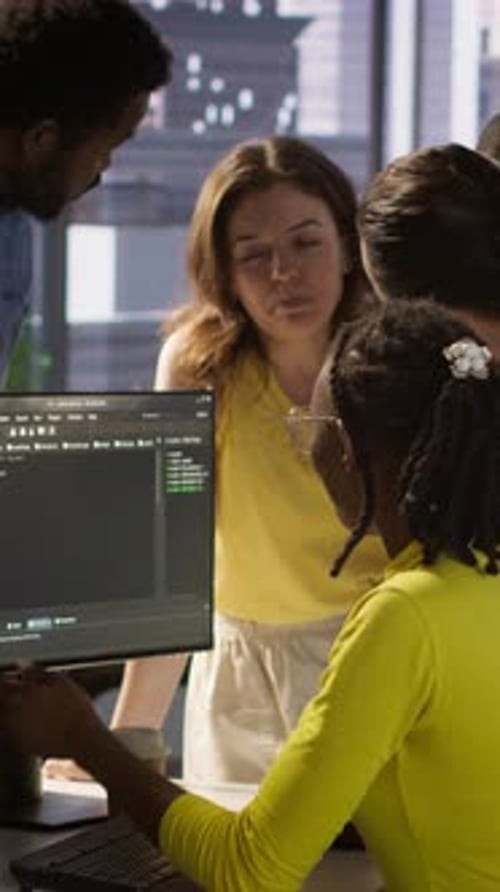 Vertical Video Team of Programmers Fighting in Office While Checking Code Having Disagreement
