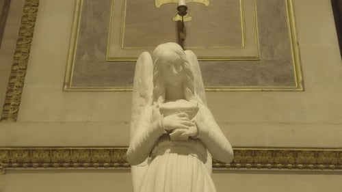 Angel statue in church of La Madeleine, Paris in France