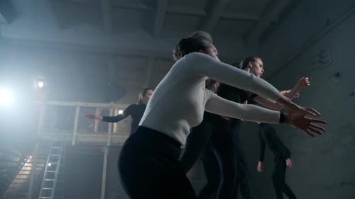 Bottom Angle View of Talented Theater Director Talking Moving Slowly with Actors and Actresses