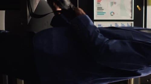 Vertical Video Detective Arriving in Office with Laptop