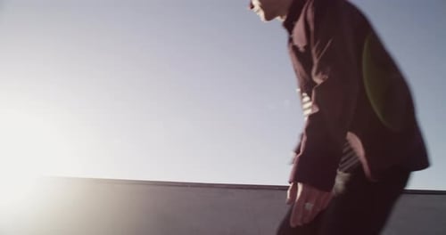 4k video footage of a young man out skating at a skatepark