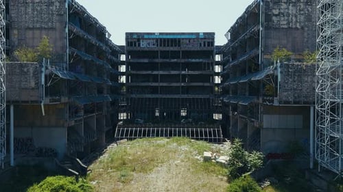 abandoned Blato hospital courtyard enclosed by decaying walls