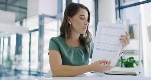 4k video footage of a young businesswoman having a video conference in a modern office