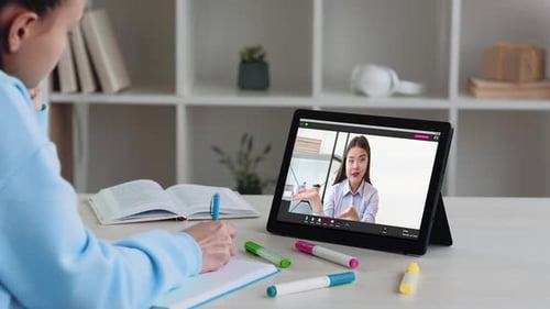 Girl Studying with Online Teacher on Tablet