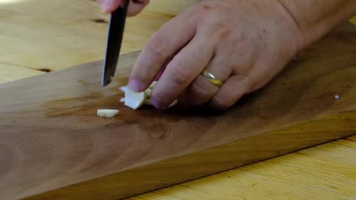 the chef cutting the onion