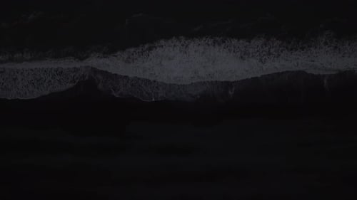 Monochrome Ocean Waves at Night
