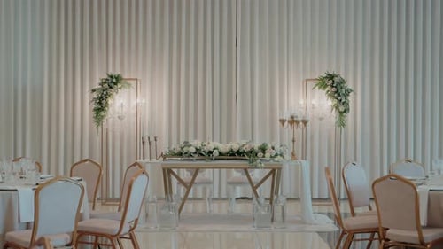 Elegant Wedding Reception Table Setup in a Venue