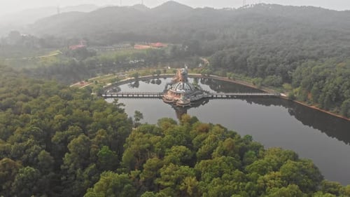 Wide view of famous big dragon at Thuy Tien lake Abandoned Water Park Vietnam, aerial