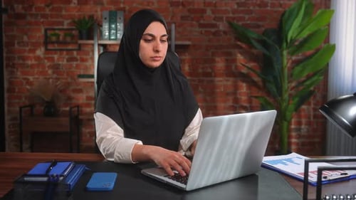 Business Professional Woman Working at Modern Office Desk