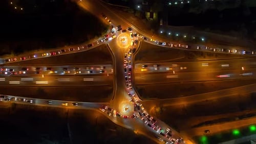 Time Lapse Cars on Highway Intense Traffic During Rush Hour Crossroad Modern Intersection at Night