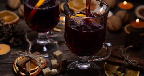 Preparing Mulled Wine in Glasses for Winter Holidays