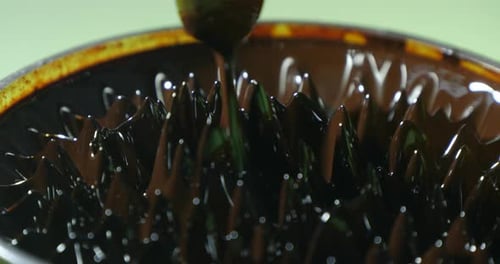 Ferrofluid. Ferromagnetic Fluid Creates Amazing Drawings Spikes in a Magnetic Field