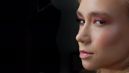 Beautiful Woman with Makeup in Close Up