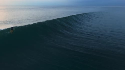 Breaking Surfing Wave in Ocean Perfect Waves with Sunset Light