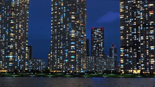 Illuminated High-Rise Apartment Facades