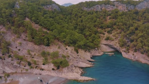 Aerial Video Footage From a Drone of a Beach in a Blue Bay