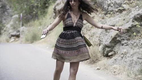 Closeup Video of an European Young Girl Dancing in a Rustic Road