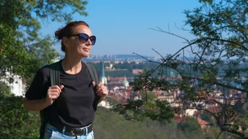 Tourist Enjoying Panoramic View of Prague From Petrin Hill