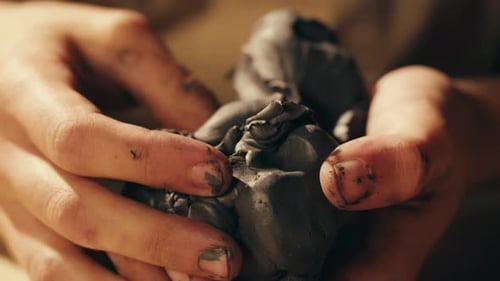 Man Potter Works with Clay on Master Class in Studio Working Process in Ceramic Workshop Potter