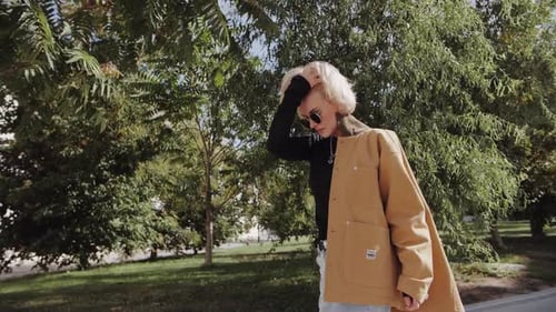 Blonde Woman Walks Down Street Brown Coat Slow Motion Autumn Fashion The Trend