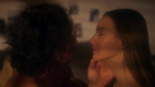 Intimate Couple Embracing Tenderly in Warm Lighting