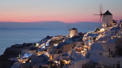 Windmills in Oia at sunset, Santorini, Greece