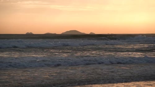 Slowmotion View of the Sea Waves at Sunrise