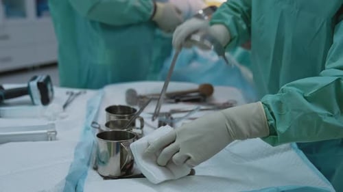 Surgical Team Performing Delicate Operation in Hospital