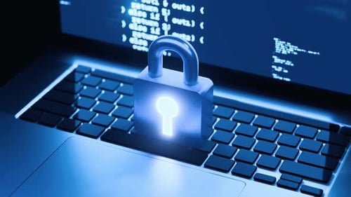 Cybersecurity concept with glowing padlock on laptop