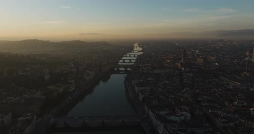 Aerial view of Florence downtown along the Arno river, Tuscany, Italy.