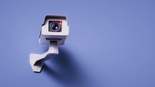 La cámara de seguridad montada en la pared gira y graba Vídeo.