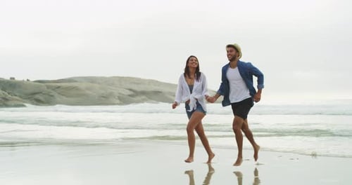 Beach, love and happy couple holding hands, running and bonding on tropical journey from island