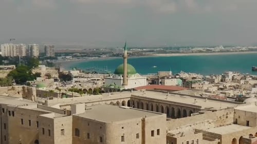 Old city acre fortress on the stone coastline of sea