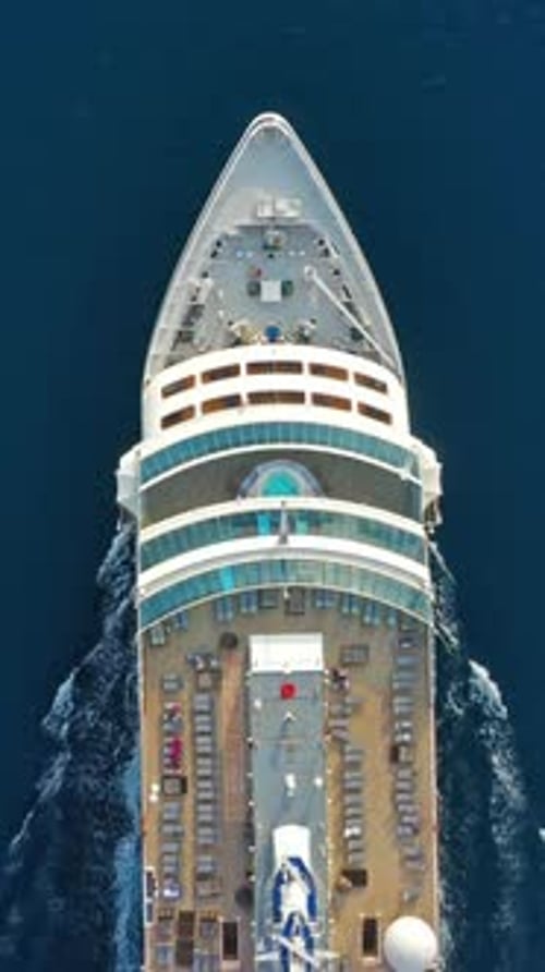 Sailing cruise ship aerial top view