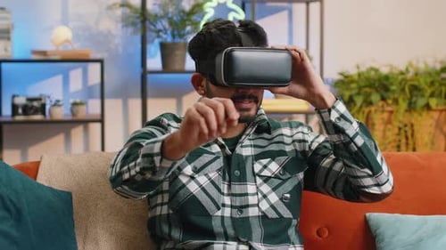 Man Using VR Headset at Home