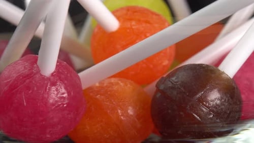 Colorful Lollipops in a Clear Glass Bowl