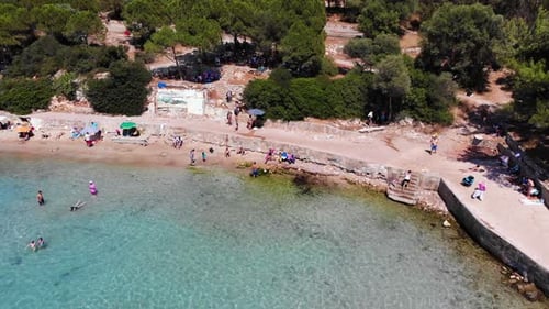 People swimming in the sea and sunbathing on the beach on the Turkish coast