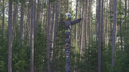 A Indigenous Totem Pole Stands Amongst A Forest, Algonquin Provincial Park