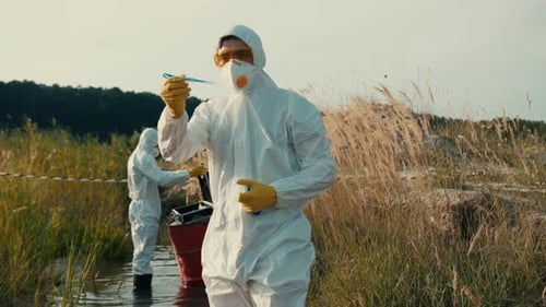 Scientists Testing Sample in Polluted Area