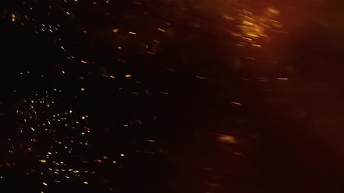 SlowMotion Patterns of Shimmering Particles in Motion Bokeh Lights Background on Black Background