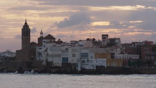 The City Skyline on Sunset Near the Water A Few Clouds on the Sky