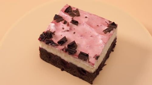 Rotating Slice of Layered Chocolate Cherry Dessert