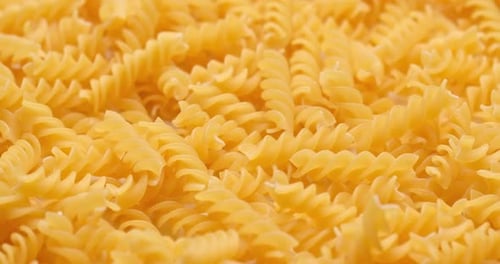 Pasta Backgroud Macro View of Dry Authentic Italian Fusilli
