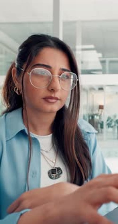 Business, woman and typing on computer in office for research, proofreading and editor feedback