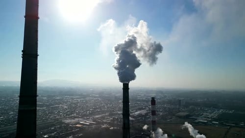 Bishkek thermal power station, close circling shot of smoke from the chimney