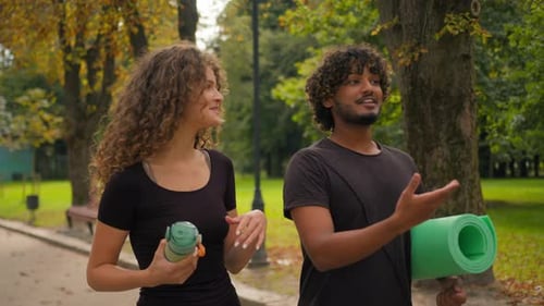 Happy Young Girlfriend Boyfriend Walk Street Together Multiracial Caucasian Woman Indian Man Talking