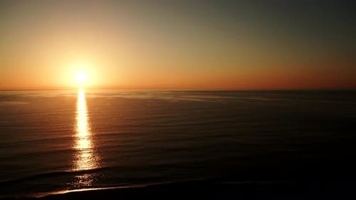 Sun Rising Over Sea.