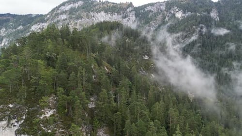 Clouds drifting over Wooded Hillside in Bavaria Germany Drone Aerial view