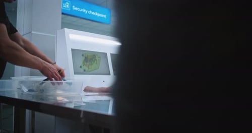 Airport Security Checkpoint with Officer and Scanner